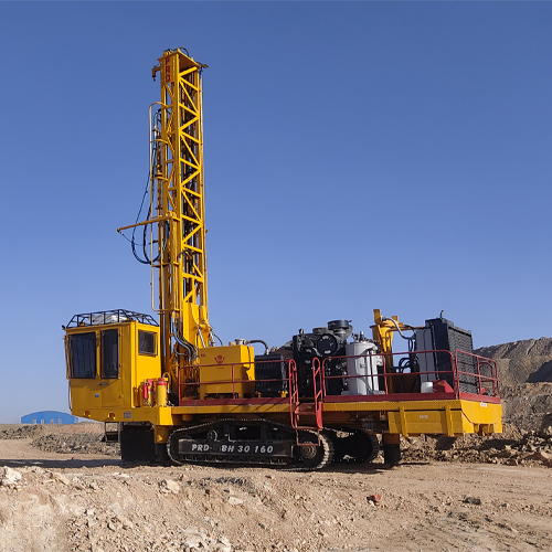 Technician performing preventive maintenance on industrial drilling rig to reduce downtime and boost ROI
