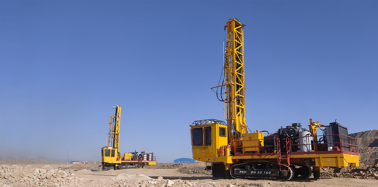 Technician performing preventive maintenance on industrial drilling rig to reduce downtime and boost ROI